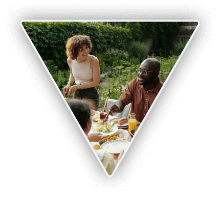 Happy people enjoying a meal outside pest free